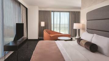 Suite, 1 King Bed, Corner | Premium bedding, pillowtop beds, individually decorated, desk