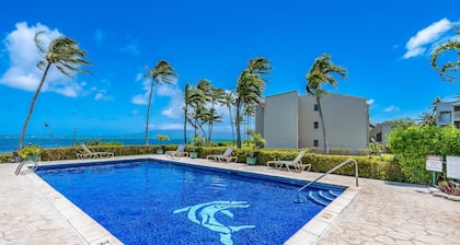 Ocean-view condo with private balcony, washer/dryer, & shared pool/tennis courts