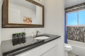 Hair dryer, towels, soap, shampoo