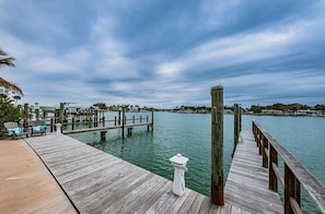 Stroll along the pier and enjoy the serene views of the marina.