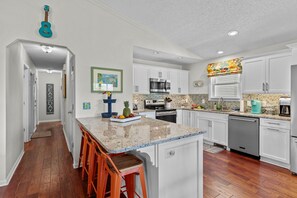 Fridge, microwave, oven, stovetop - Dog Friendly,  private beach home by the pier (Kure Beach)