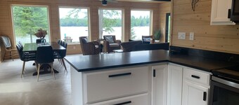 Cozy 4-bedroom lake house with private boat dock on the Chain of Lakes!