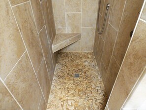 Bathtub, hair dryer, towels, soap