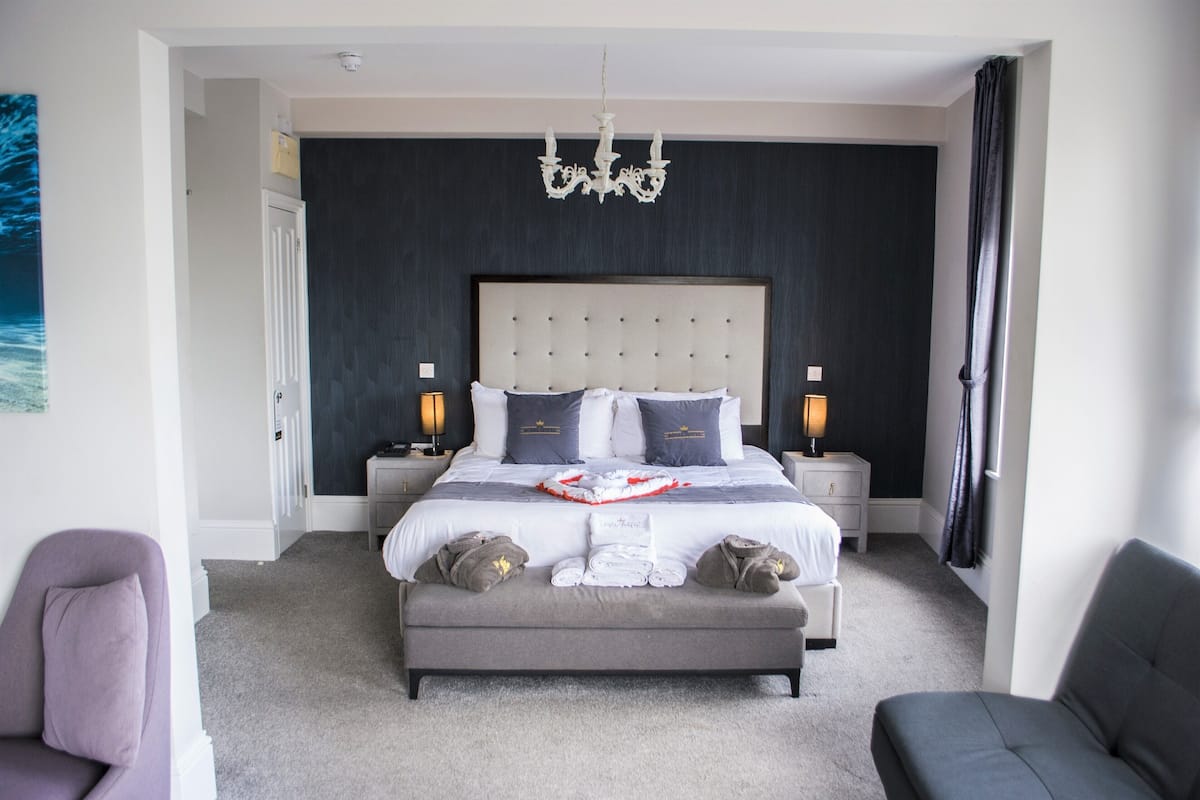 Royal Quadruple Room | Hypo-allergenic bedding available, memory foam beds, in-room safe, desk