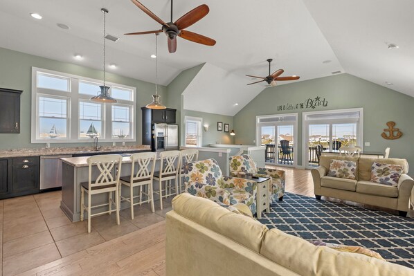 TV connectée, lecteur de DVD, baby-foot, espaces bureaux