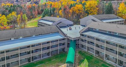 Ski-in/out 2-story condo with balcony, on-site indoor pool, hot tub, sauna, W/D