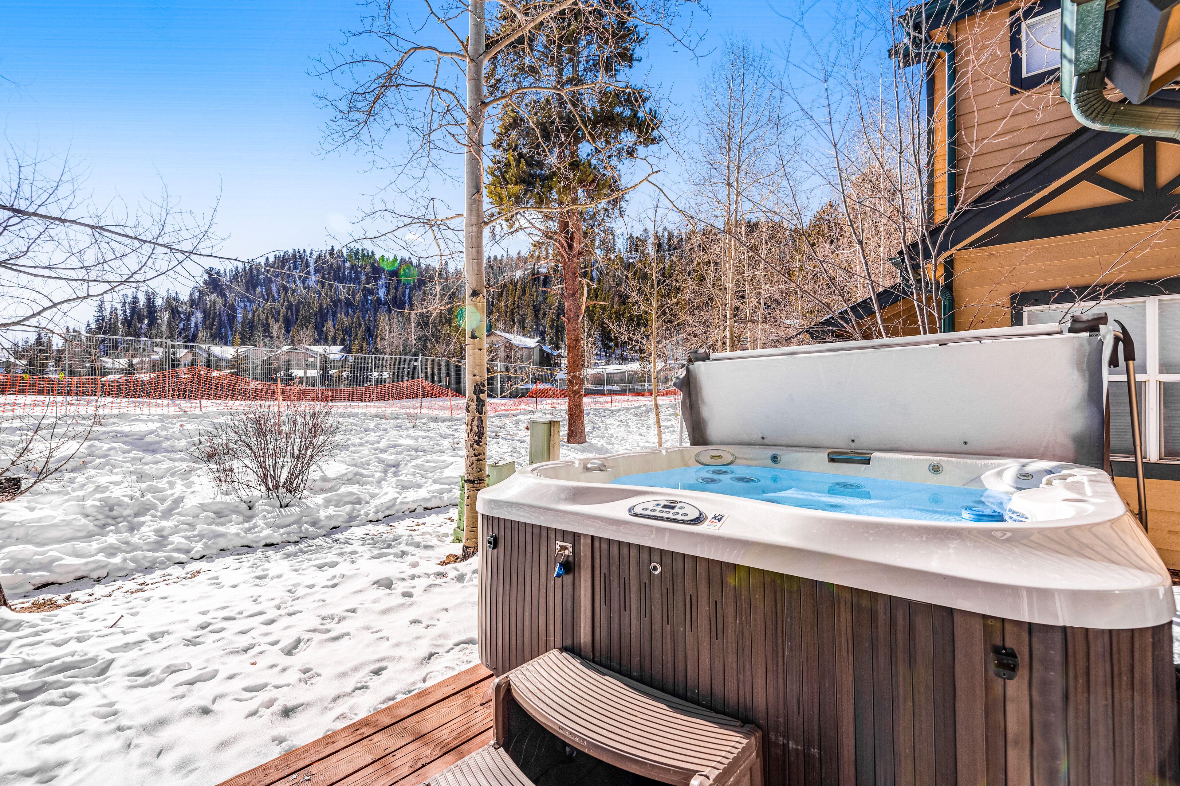 Mountain-view townhome - private hot tub & fireplace - walk to lifts & downtown