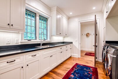 Luxe lakefront home with dock, kayak, canoe, home gym & great outdoor spaces