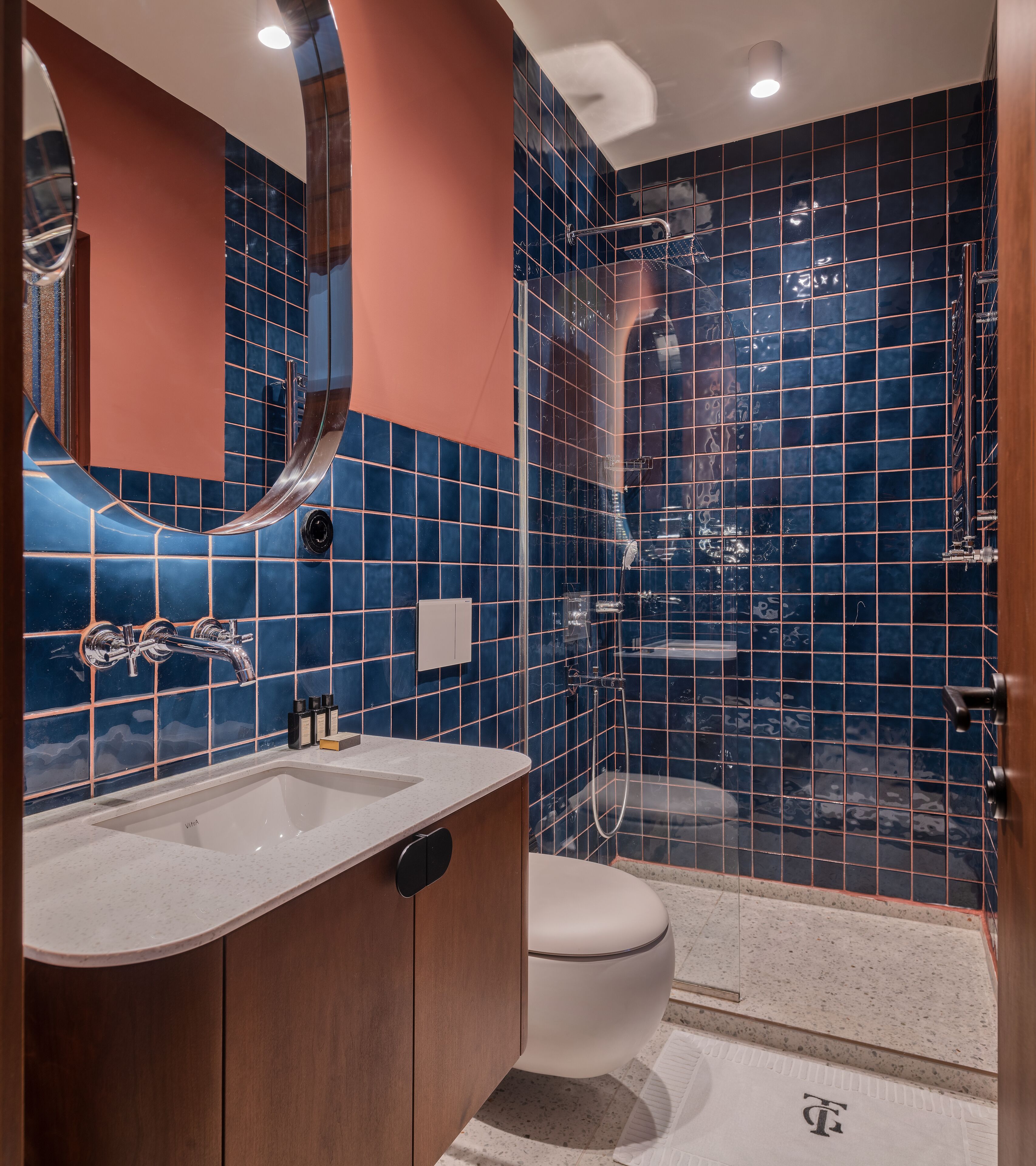 tom room | bathroom | shower, hydromassage showerhead, designer toiletries, hair dryer