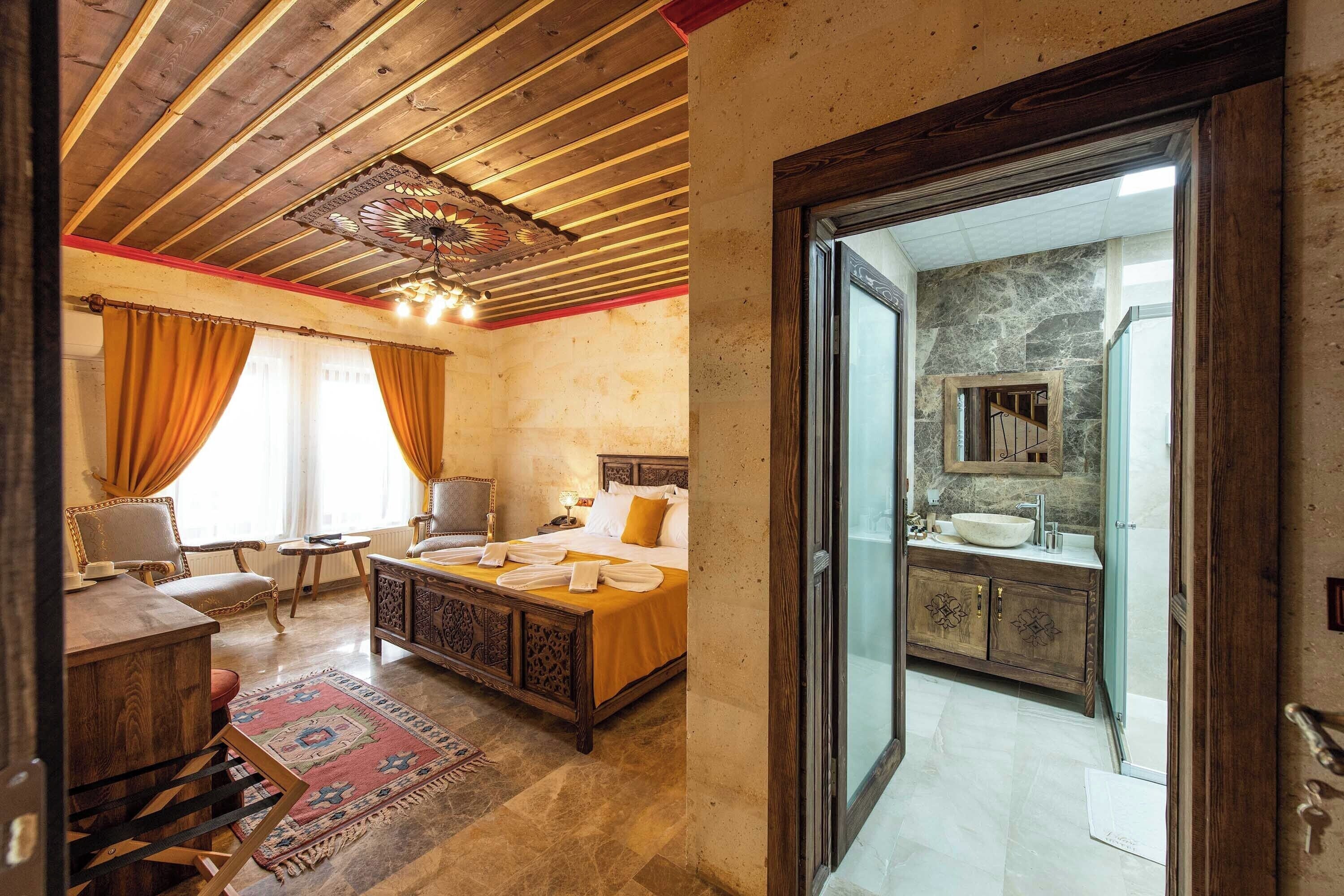 deluxe double room | premium bedding, minibar, in-room safe, individually decorated