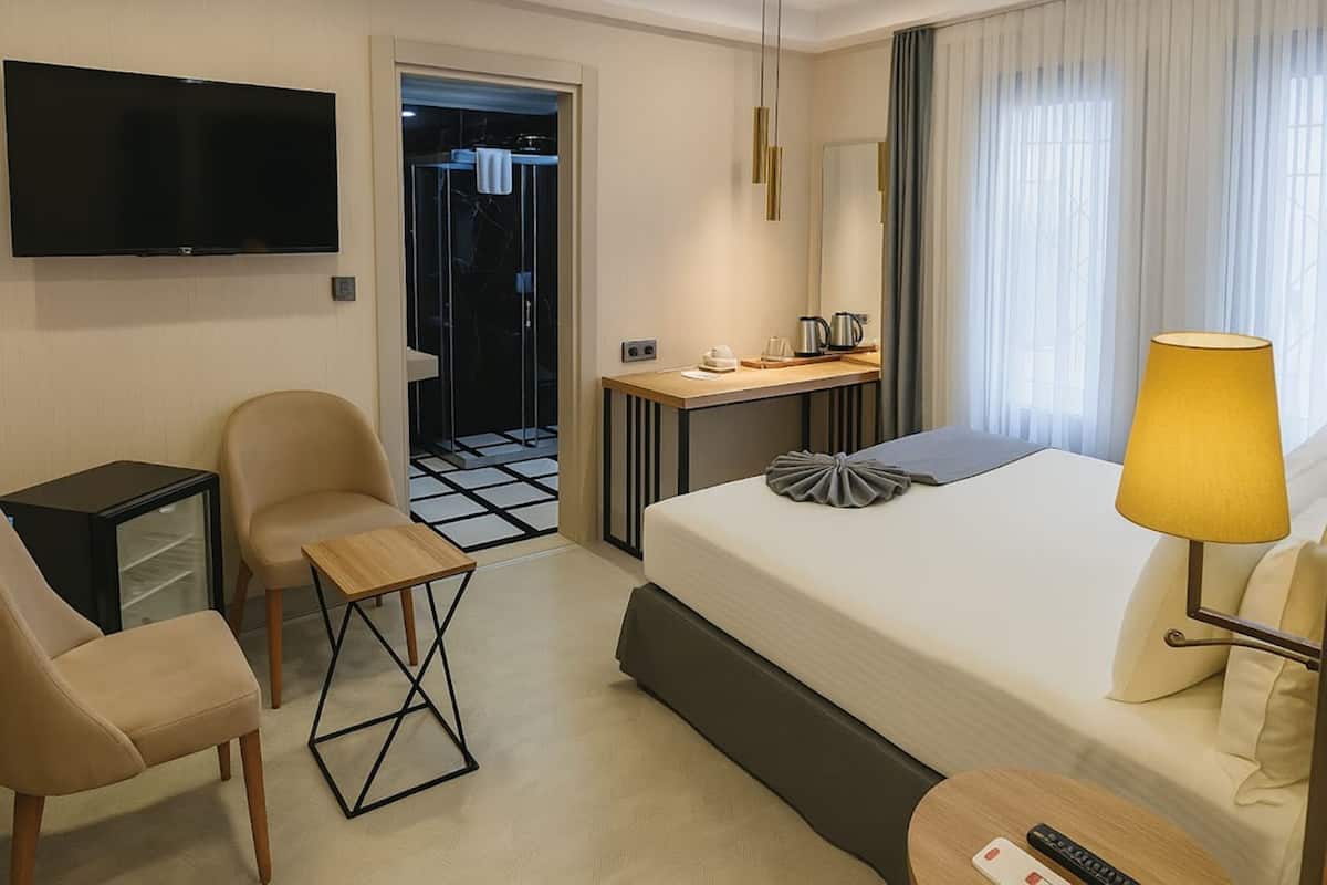 Quarto casal ou duplo standard, no piso térreo | 1 quarto, roupas de cama premium, frigobar, cofres nos quartos
