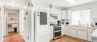 Contemporary dog-friendly home with backyard, patio, washer/dryer, pellet stove