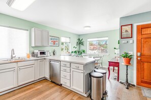 Fridge, microwave, oven, stovetop - Contemporary dog-friendly home with backyard, patio, washer/dryer, pellet stove (Westport)