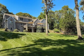 Exterior - Spacious home with huge deck & tree-lined yard, grill, & WiFi - great location (Orleans)