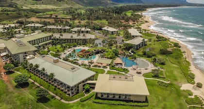 Water-view 3rd-floor condo with community pool & grills - near sights & dining