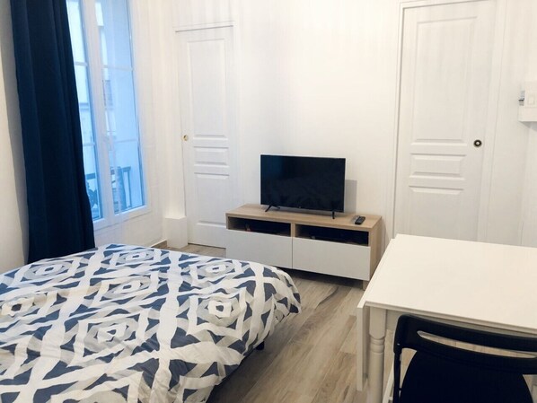1 habitación, tabla de planchar con plancha, wifi y ropa de cama 