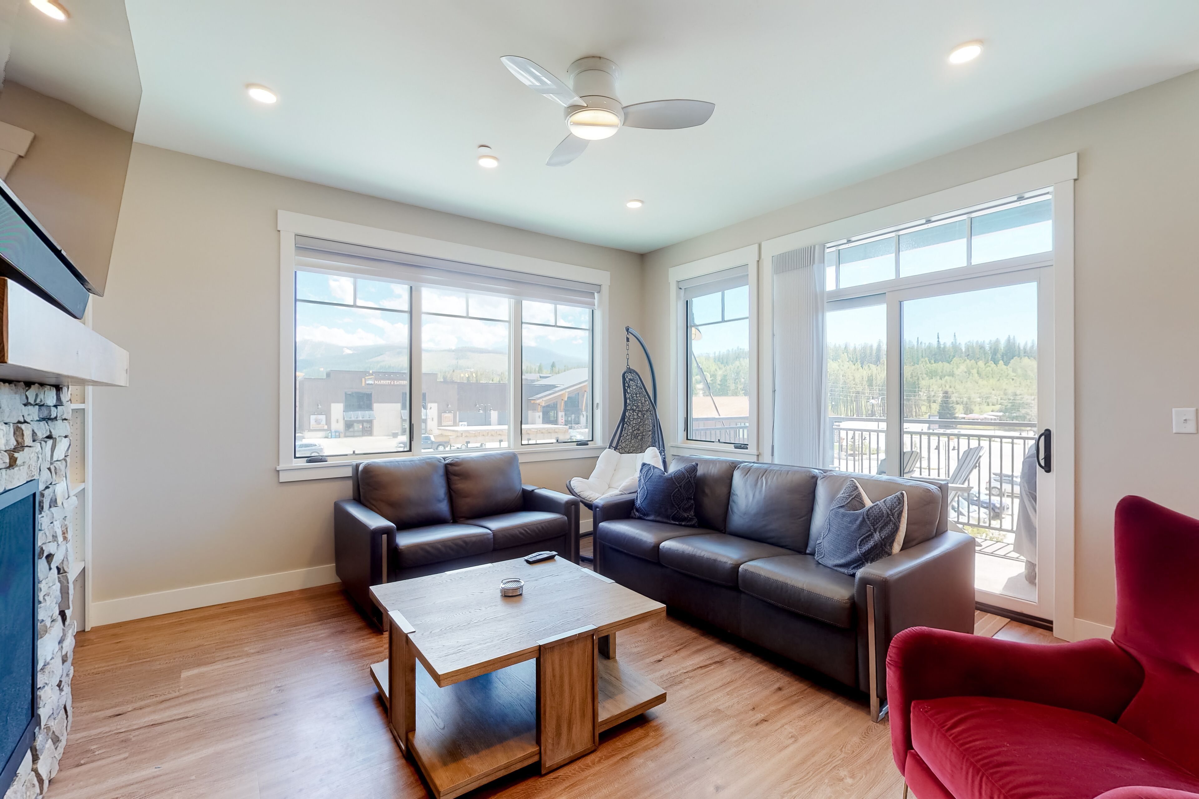 Mountain-view corner condo with hot tub access & fireplace