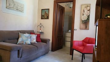 TV, fireplace, books