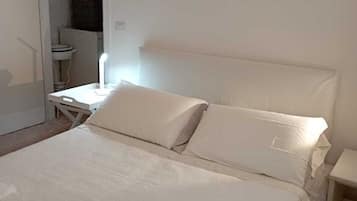 2 dormitorios, tabla de planchar con plancha, wifi gratis y ropa de cama