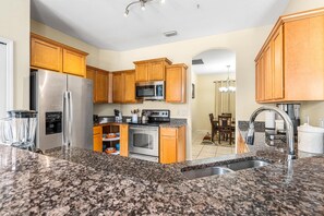 Fridge, microwave, oven, stovetop - Beautiful spacious 4 bedrooms and 2 baths house in Palm Bay. (Palm Bay)