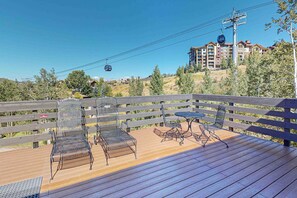Outdoor dining - Mountain-view condo with private balcony, grill, fireplace, on-site hot tub, gym (Steamboat Springs)