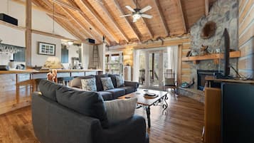 Smart TV, fireplace, books, stereo