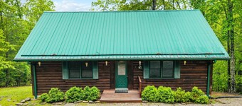Large Log home, private pond with dock, pool table, hot tub & internet.