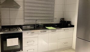 Apartment | Private kitchen | Full-size fridge, oven, stovetop, toaster oven