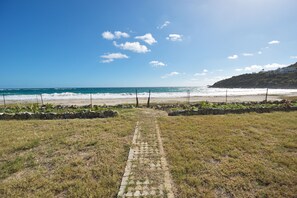 On the beach, sun loungers, beach towels
