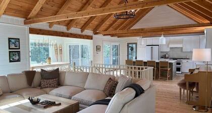 Spacious house with pebble beach. Direct access to Snowmobile and ATV trails!
