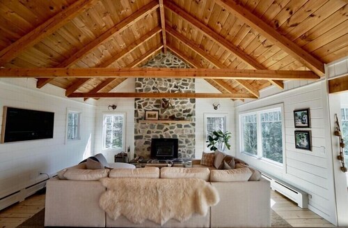 Spacious house with pebble beach. Direct access to Snowmobile and ATV trails!