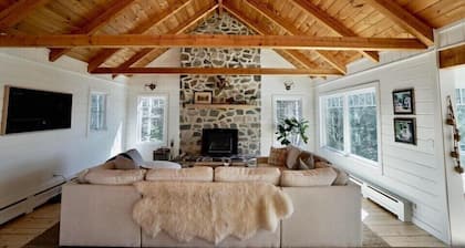 Spacious house with pebble beach. Direct access to Snowmobile and ATV trails!