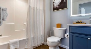 Combined shower/bathtub, hair dryer, towels, soap