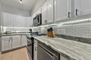 Fridge, microwave, oven, stovetop - Luxury condo right on the beach! Enjoy the oceanfront at discount prices! (Jacksonville Beach)