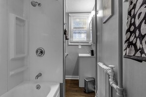 Combined shower/tub, hair dryer, towels, soap