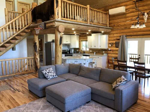 Private Log Cabin with breathtaking views on 15 acres adjacent to forest service