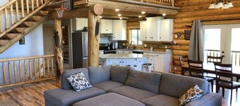 Private Log Cabin with breathtaking views on 15 acres adjacent to forest service