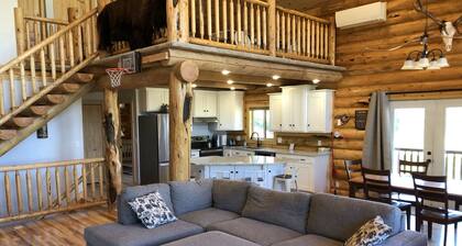 Private Log Cabin with breathtaking views on 15 acres adjacent to forest service