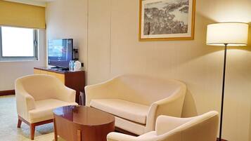 Executive Twin Room | Living area | 50-inch LCD TV with digital channels, TV