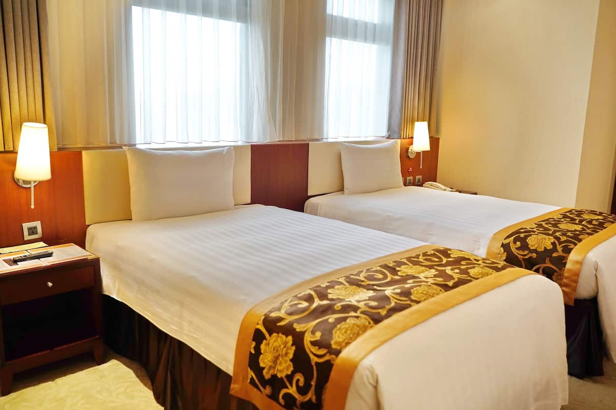 Premium bedding, down duvets, minibar, in-room safe