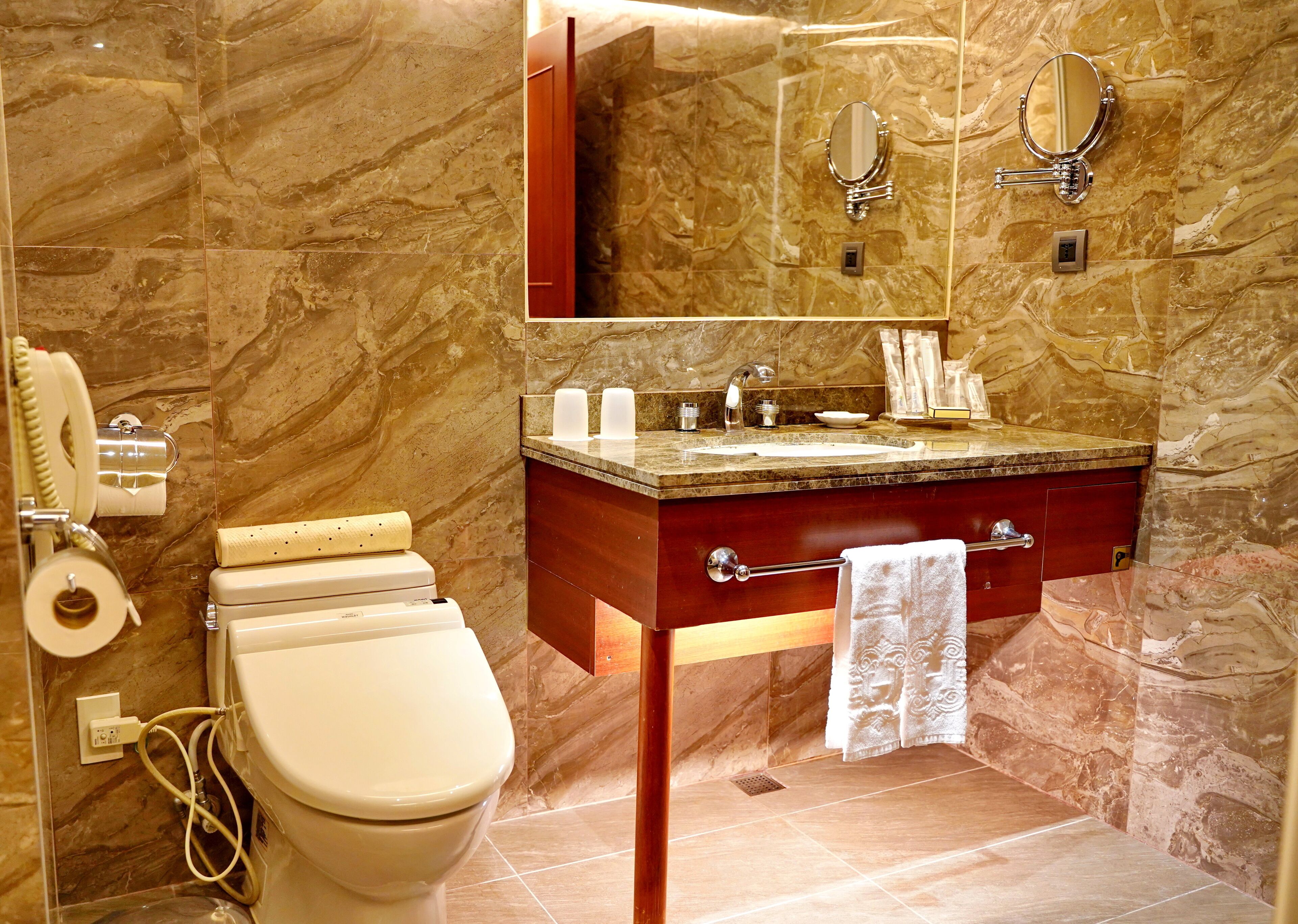 superior twin room | bathroom | rainfall showerhead, hair dryer, slippers, electronic bidet
