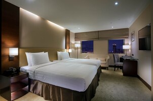 Superior Twin kamer | Luxe beddengoed, donzen dekbedden, een minibar, een kluis op de kamer