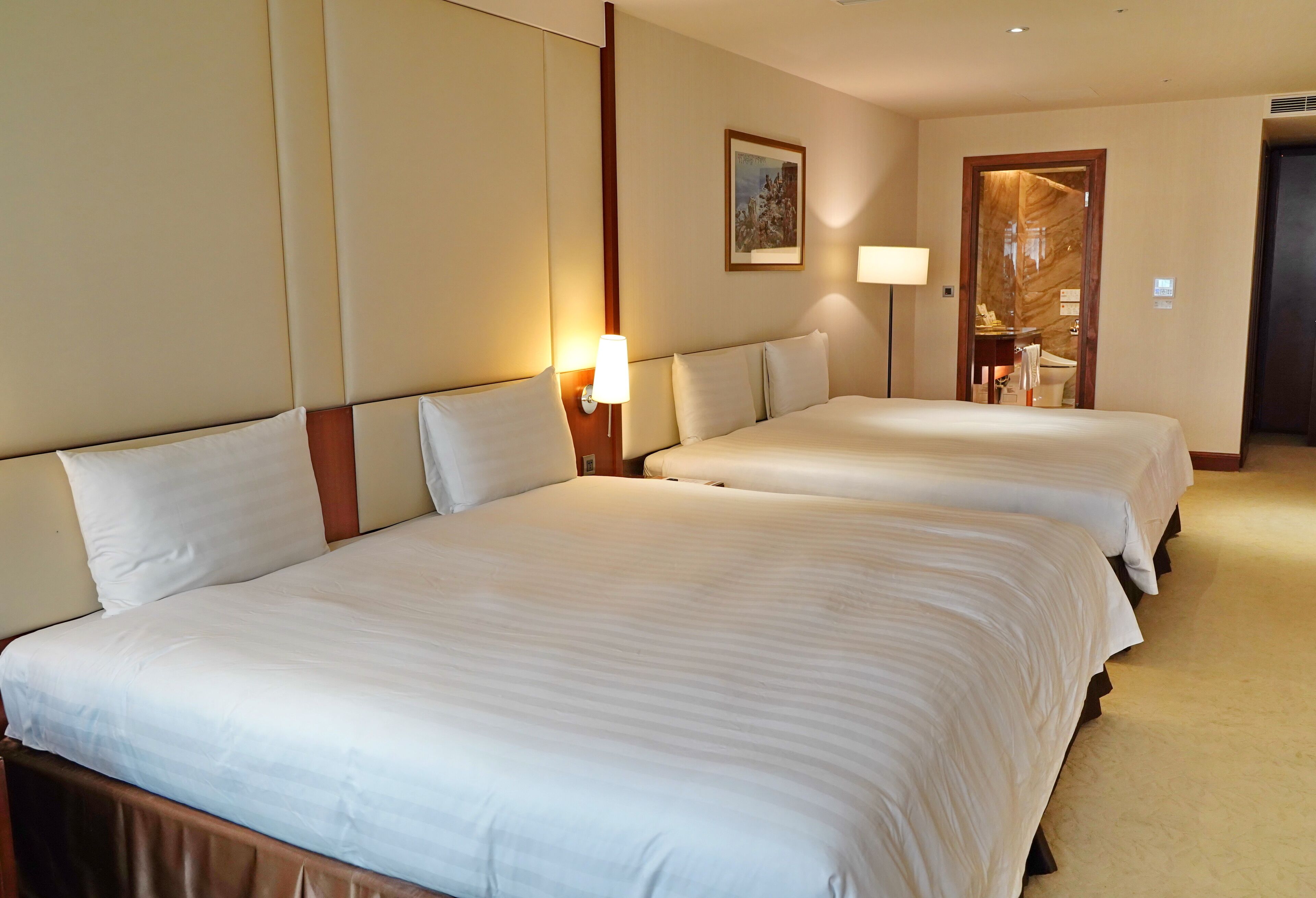 deluxe quadruple room | premium bedding, down duvets, minibar, in-room safe