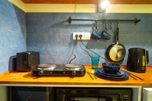 Private kitchen | Fridge, microwave, oven, stovetop - Stunning Studio Apartment in Beograd, Serbia (Belgrade)