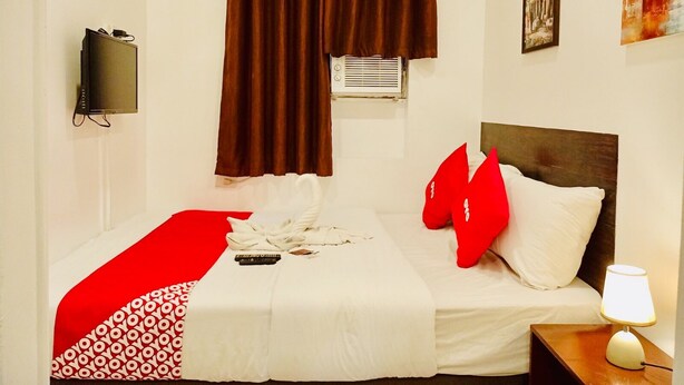 WiFi (free), bed sheets - OYO 888 City Stay Inns Fortview BGC (Makati)