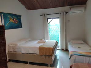 Family Room | Laptop workspace, blackout drapes, iron/ironing board, free WiFi - Pousada Canto de Imbassaí (Mata de São João)