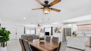 A modern kitchen with a built-in oven, a refrigerator, and a sink. - Private Heated Pool & Lovely Home (Dania Beach)