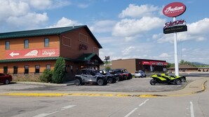 A building with a sign for Indian Motorcycle Sturgis. - Great Bungalow in the gateway to the Black Hills (Sturgis)