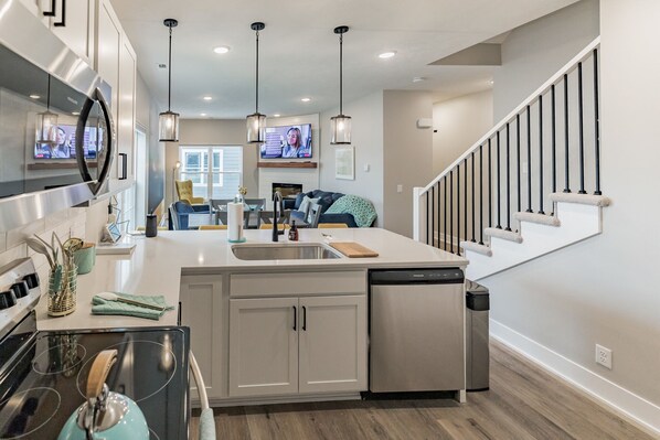 Fridge, microwave, oven, stovetop - New 3 bed 4 bath home - rooftop deck, 2 car garage & porch near downtown! (Omaha)