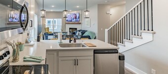 New 3 bed 4 bath home - rooftop deck, 2 car garage & porch near downtown!